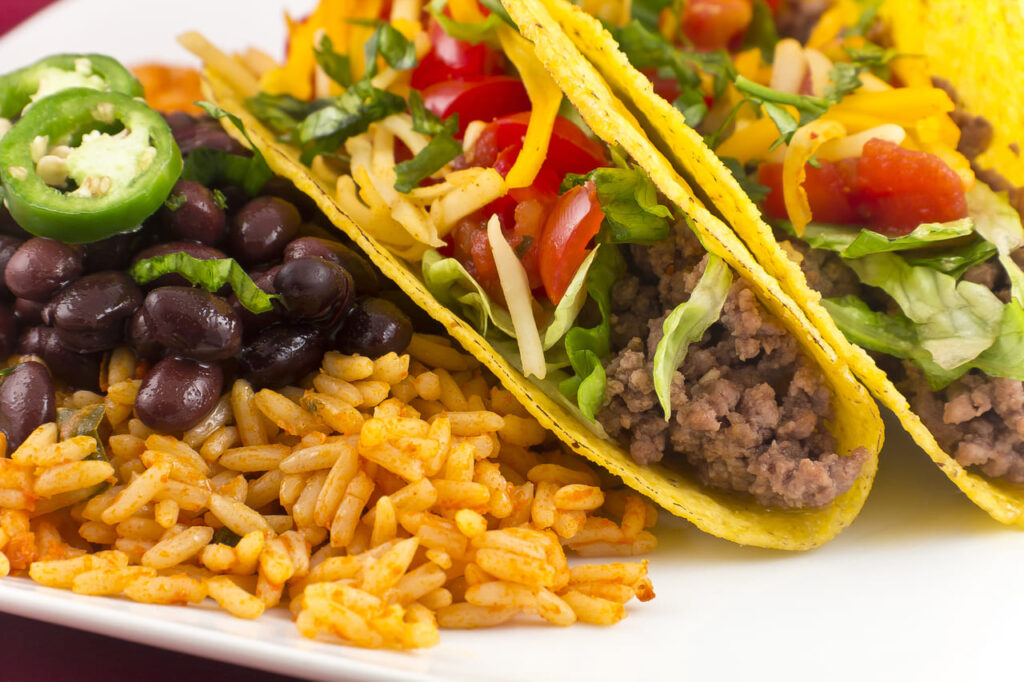 Mexican tacos with rice, black beans, and jalapenos