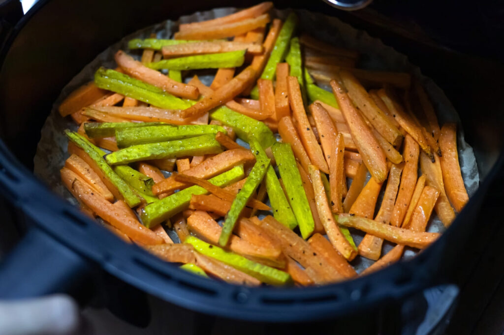 Air fryer reheating leftover pizza and fries.