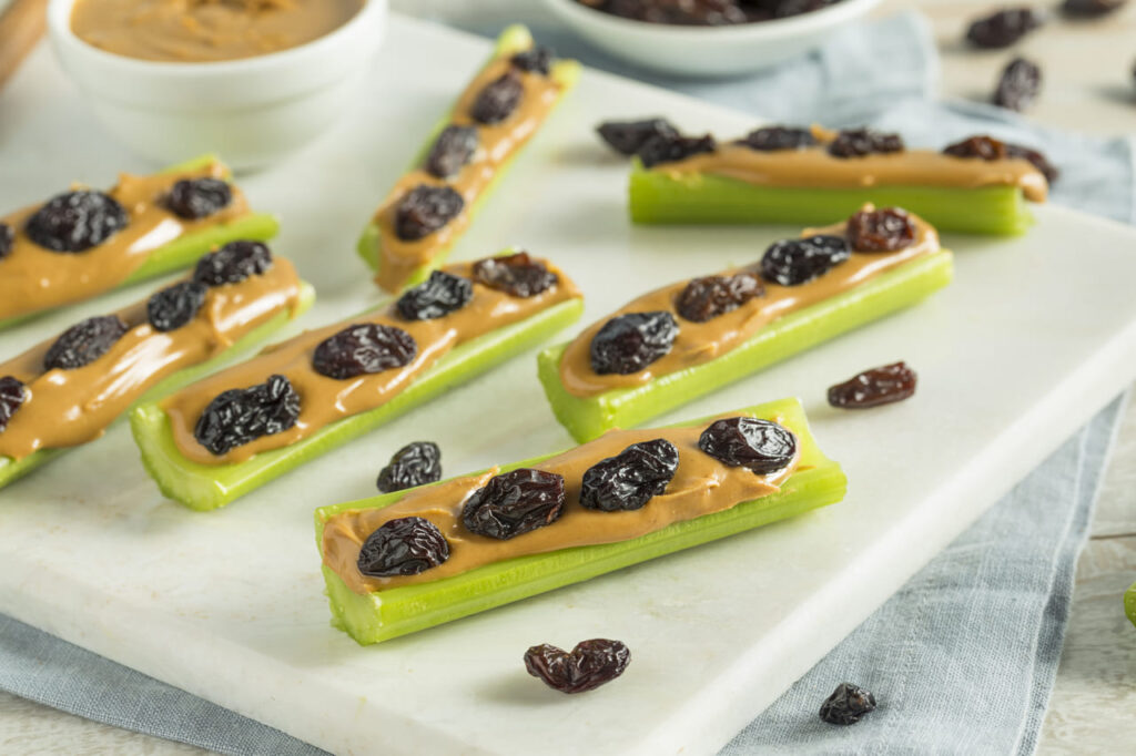 Homemade Ants on a Log Snack with Celery Peanut Butter and Raisins